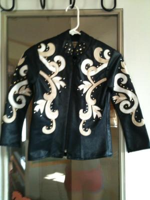 Authentic Ranchwear showmanship jacket. Mint condition, has all rhinestones and zipper works. Child's size medium.